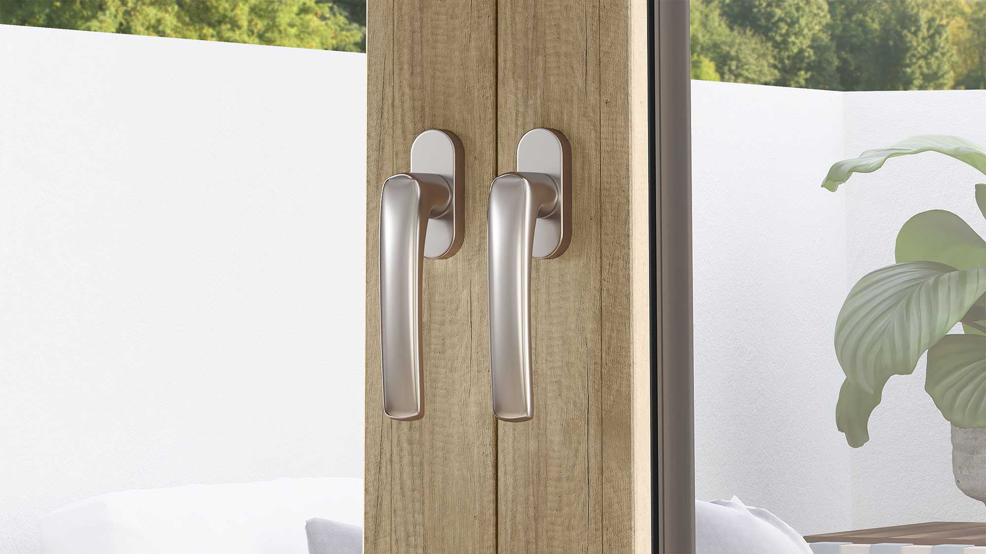 Doble maneta en ventana abatible